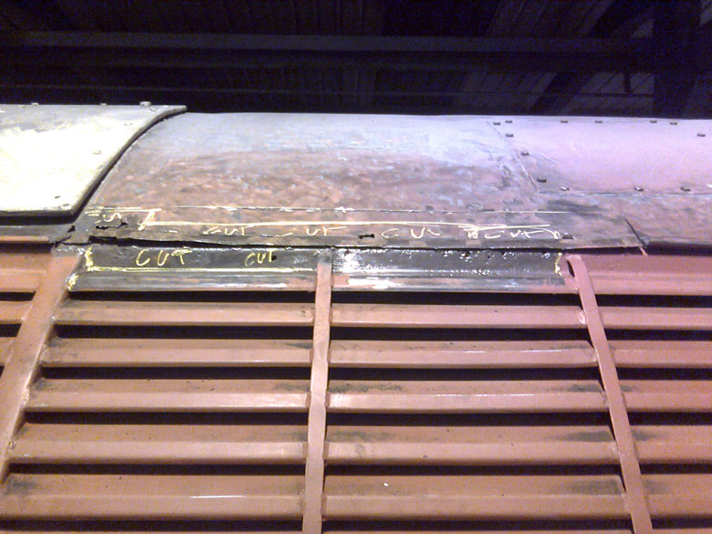First gutter section removed and shows the corrosion what 45+ years dose to the 
								boiler room roof, Photo by Andre Kent