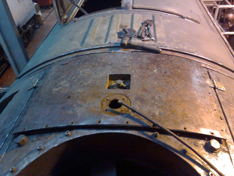 View of the cooling water header tank with the flange for the balance pipe removed, Photo by Andre Kent