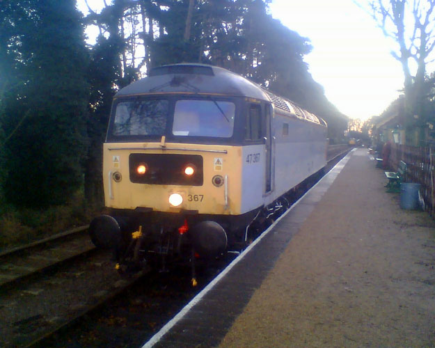 47367 at Holt wile insurance loco 31207 runs round  16/12/06, Photo by Andre Kent