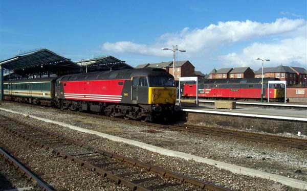 47732 with an ecs to Manchester and 47750 1K67 12:48 Holyhead - Crewe on 24/03/04, Photo by Dave Bramley