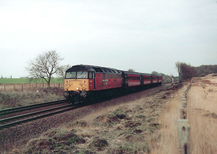 47732 approaches Parkeside East Jn. with 1D45 17:19 Manchester P. - Bangor on 29/03/04, Photo by Stuart Daniels